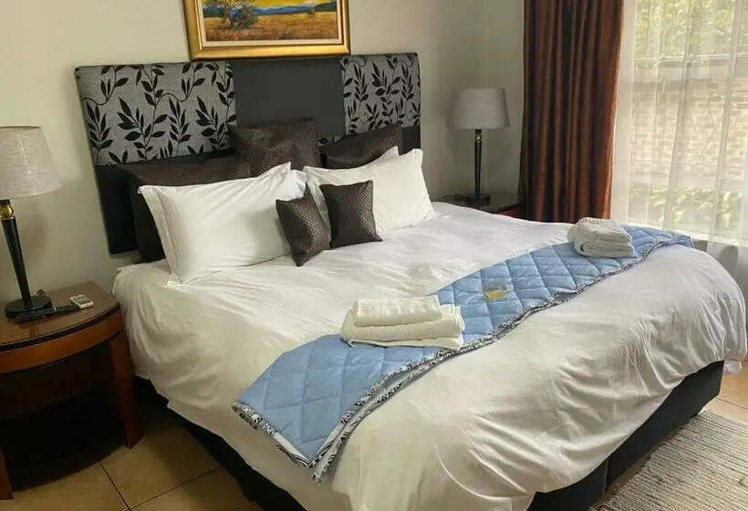 キングサイズベッドのスタンダードルーム, Africa Footprints Guest House