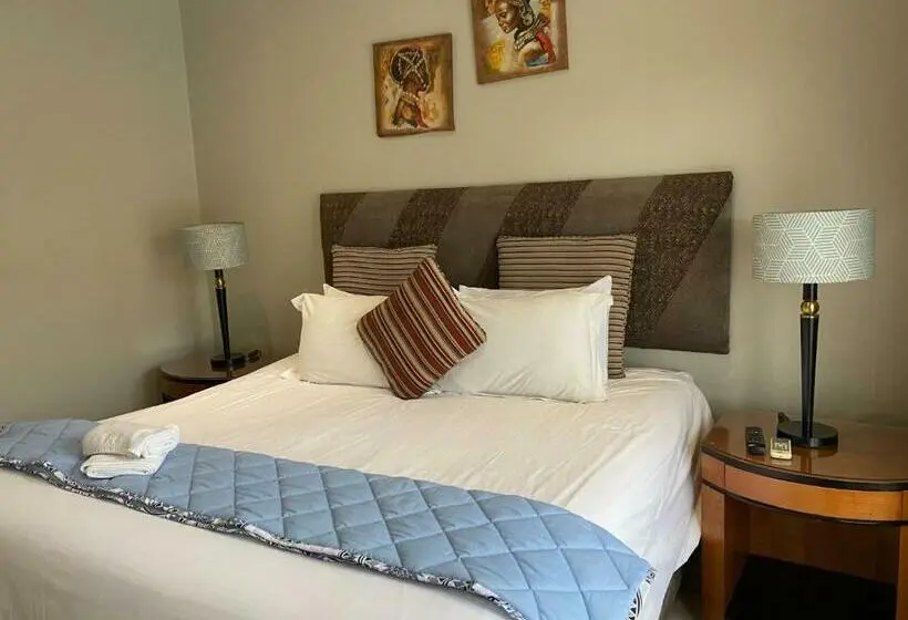 キングサイズベッドのスタンダードルーム, Africa Footprints Guest House
