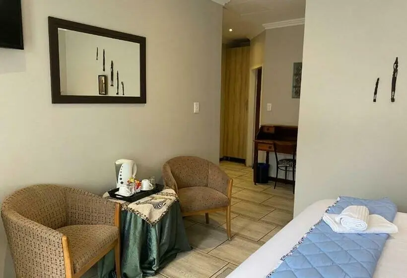 キングサイズベッドのスタンダードルーム, Africa Footprints Guest House