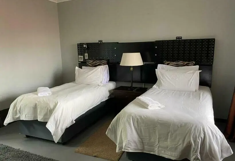 キングサイズベッドのスタンダードルーム, Africa Footprints Guest House