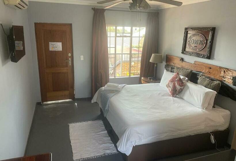 キングサイズベッドのスタンダードルーム, Africa Footprints Guest House