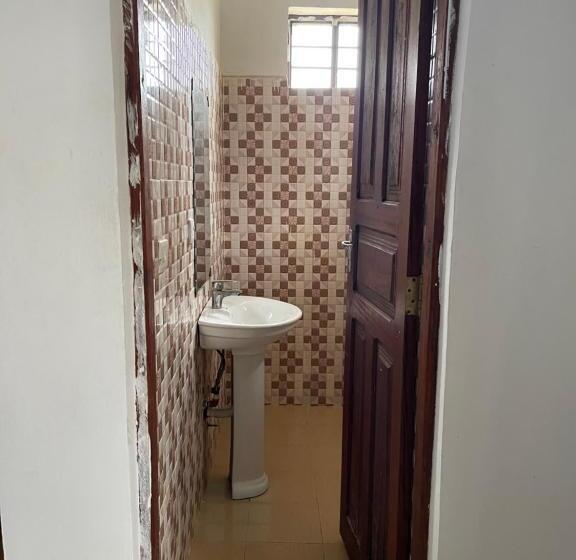 سرير فى غرفة مشتركه, Natural Kendwa Villa