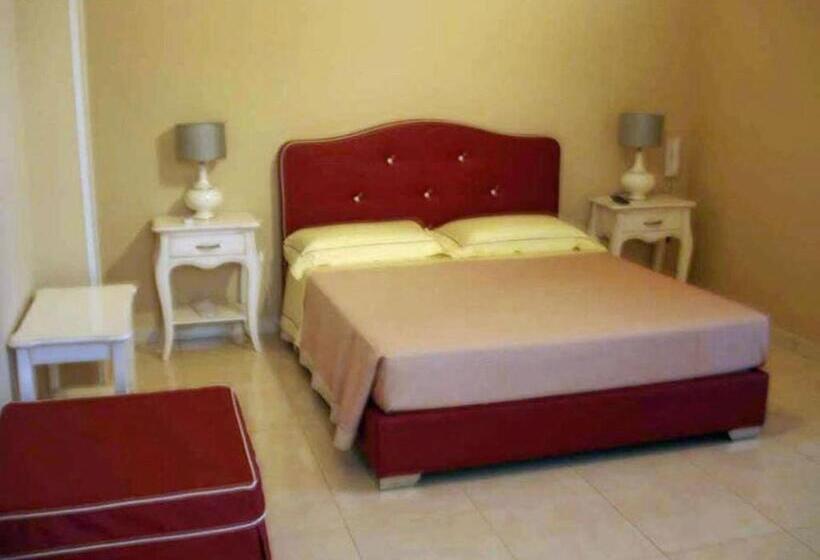 غرفة قياسية رباعية مزودة بشُرفة, B&b Sud Est