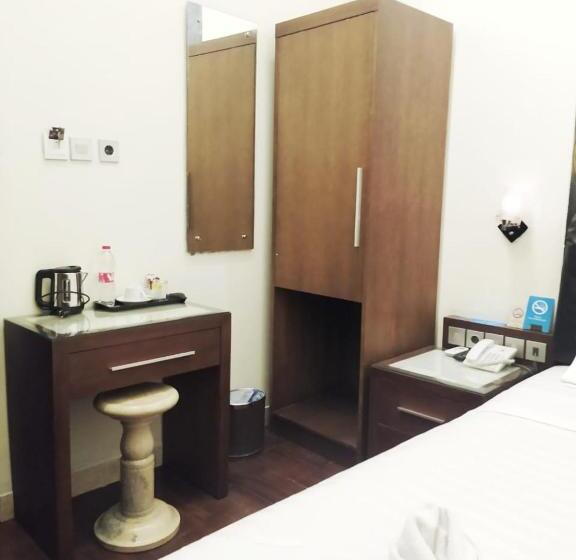 חדר סטנדרד יחיד חדר אמבטיה משותף, Omah Qu Guesthouse Malioboro