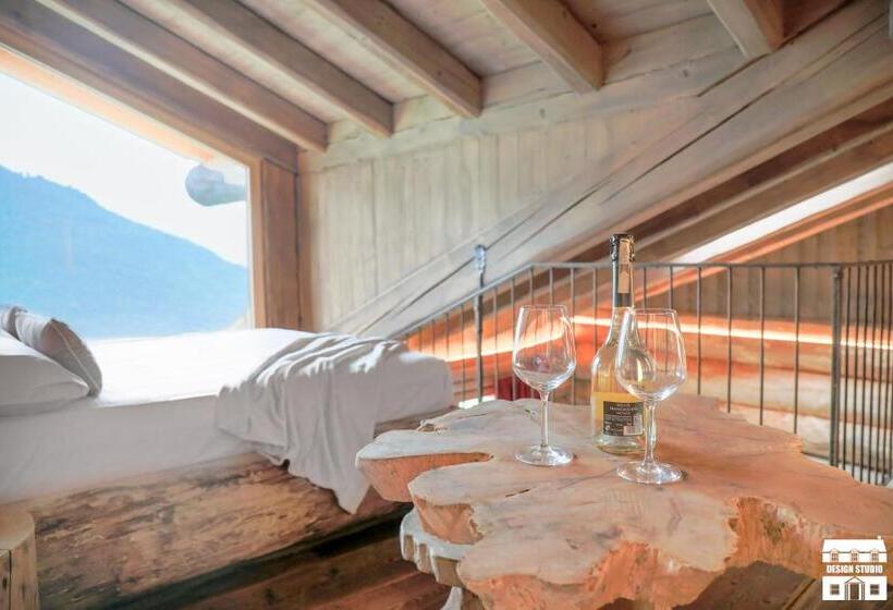 Suite with lake view, Chalet Antico Legno By Design Studio