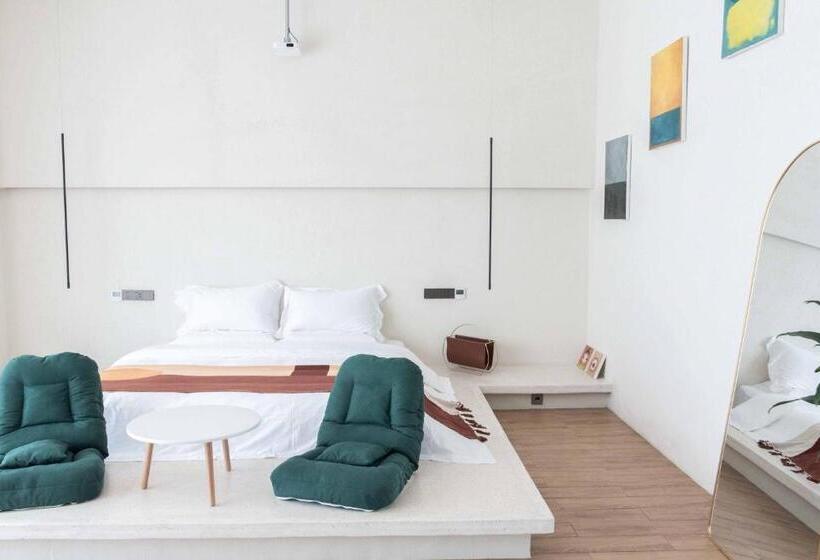 Estudio Superior, 夕下青野民宿 The Setting Sun