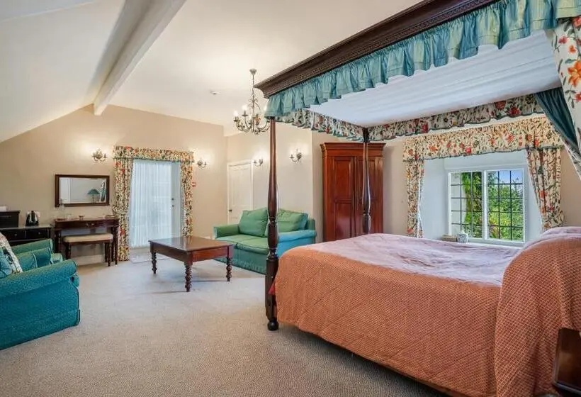 キングサイズベッドのデラックスルーム, Castle Of Comfort Hotel & Restaurant