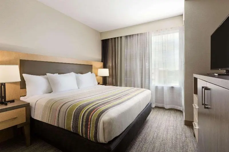 身障者適用キングサイズベッドルーム, Country Inn & Suites By Radisson, New Braunfels, Tx