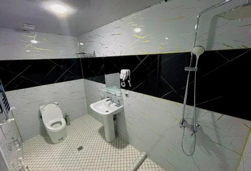 اتاق استاندارد, Status Inn