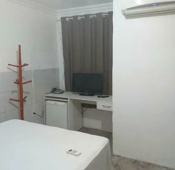 Economy Yhden Hengen Huone, Raiz