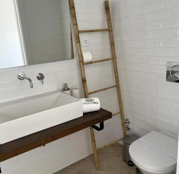 سوئیت جونیور با چشم‌انداز باغ, Villa Lobos A Sua Casa No Campo