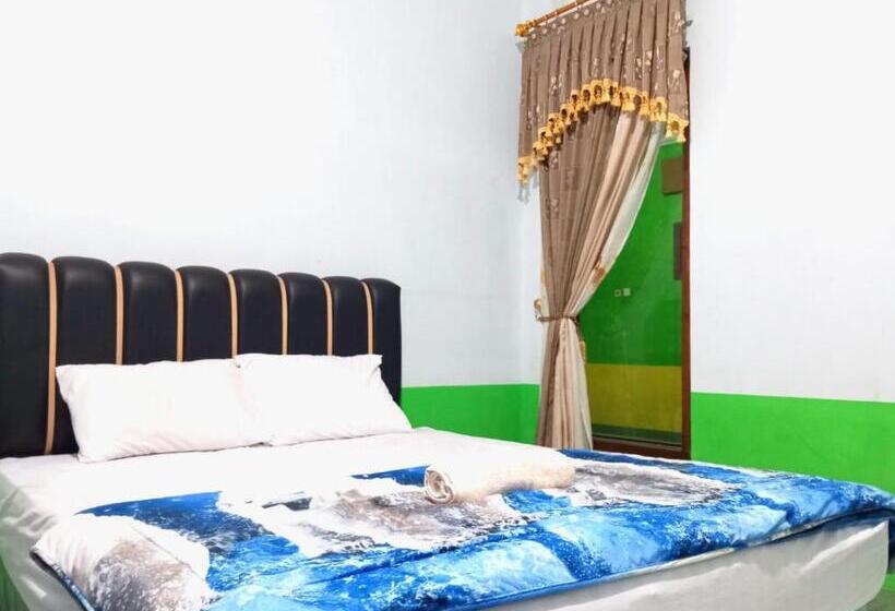 Семейный Номер, Puspa Tiara Syar I Guci Mitra Reddoorz