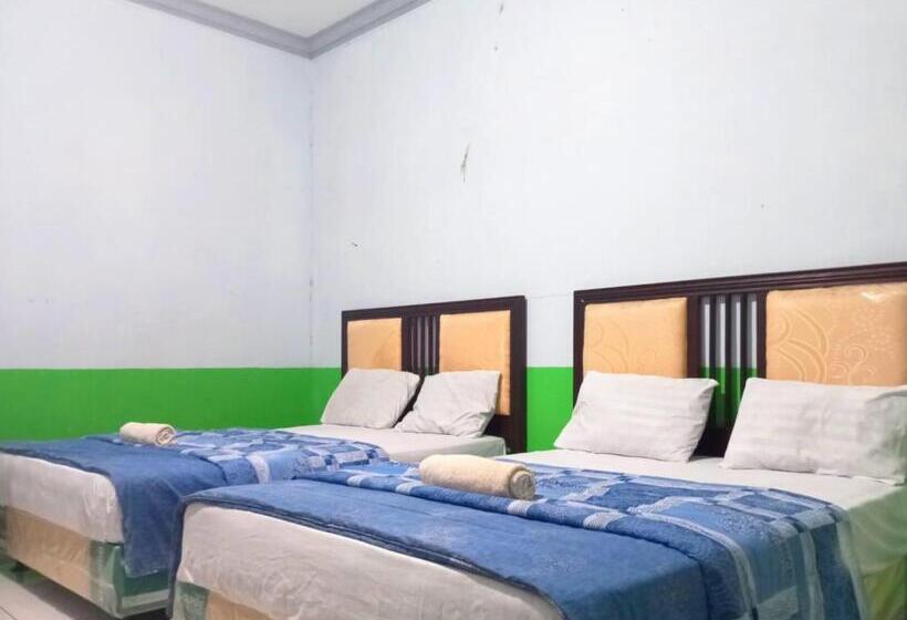 Семейный Номер, Puspa Tiara Syar I Guci Mitra Reddoorz