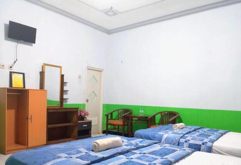 Семейный Номер, Puspa Tiara Syar I Guci Mitra Reddoorz