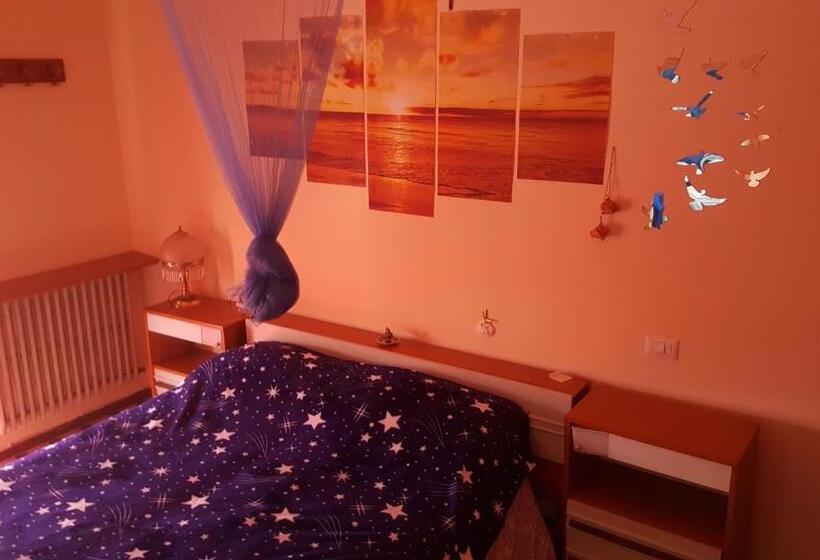 غرفة قياسية رباعية مزودة بشُرفة, B&b Le Mille E Una Notte