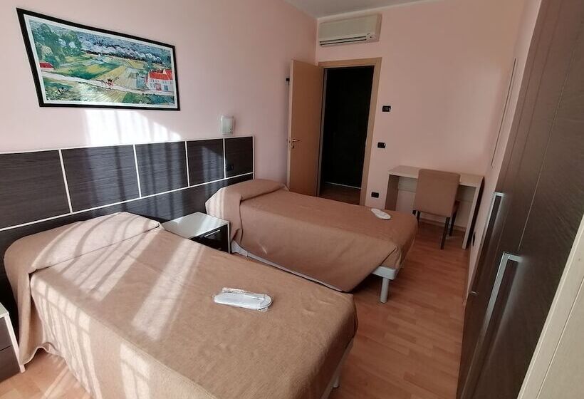 Chambre Quadruple Deluxe, Residence Zodiaco