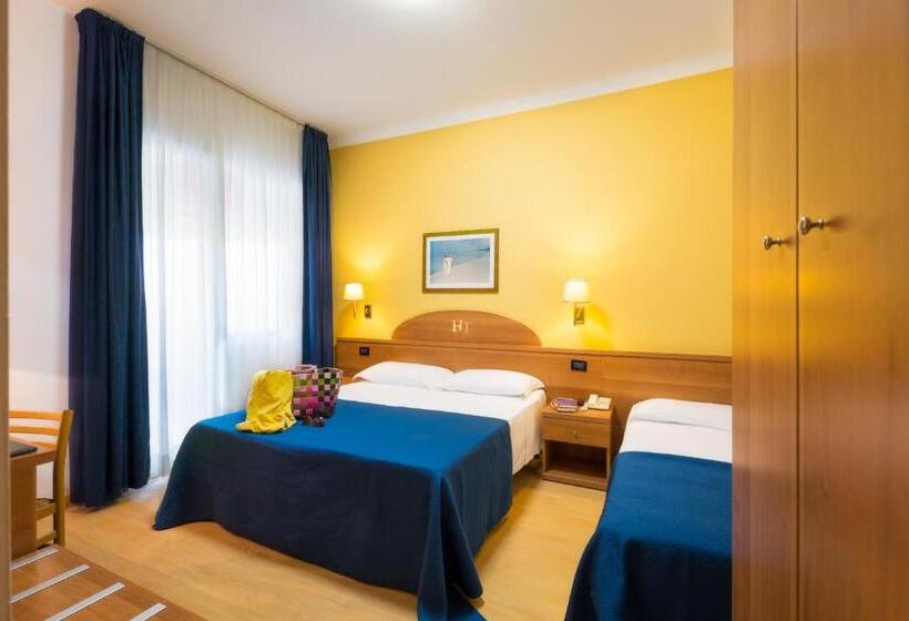 اتاق راحتی سه تخته, Tritone