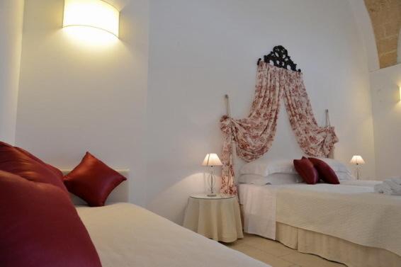 חדר סטנדרט לשלושה עם נוף לגינה, Masseria Palane