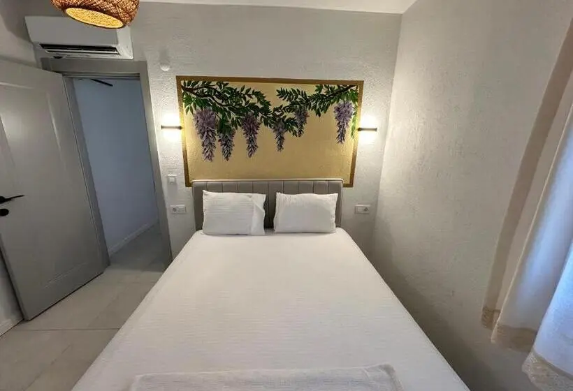 Habitació Triple Estàndard Vista Jardí, Eski Datça Otel