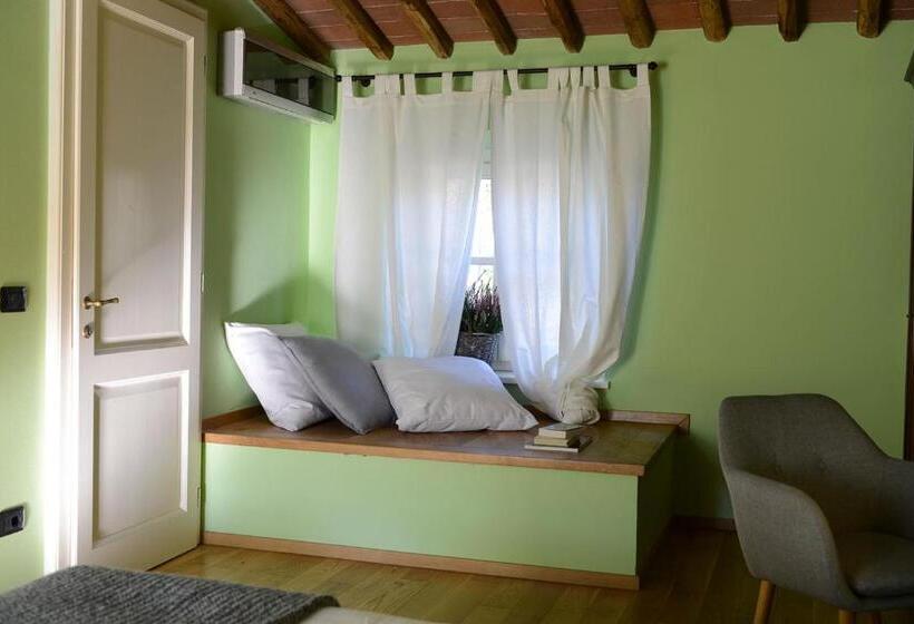 Junior Suite Vue Jardin, Ai Santinelli