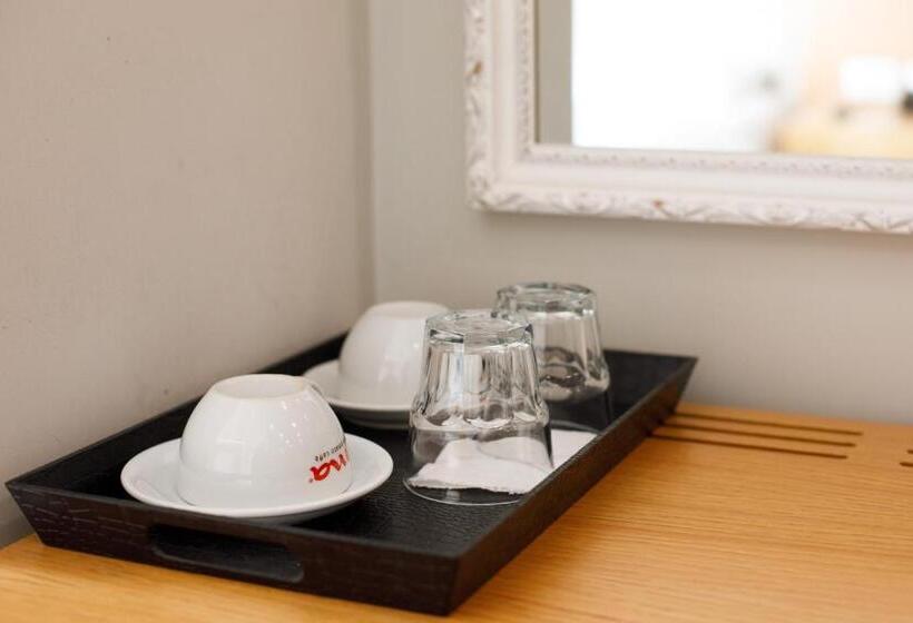 Quarto Triplo Estandar Vista Jardim, Grint