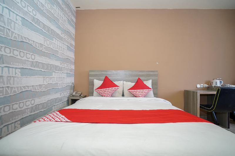 Номер Deluxe, Urbanview Best Skip Palembang