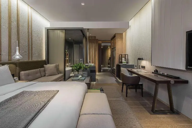 キングサイズベッドのデラックススイート, Joyze Hotel Xiamen, Curio Collection By Hilton