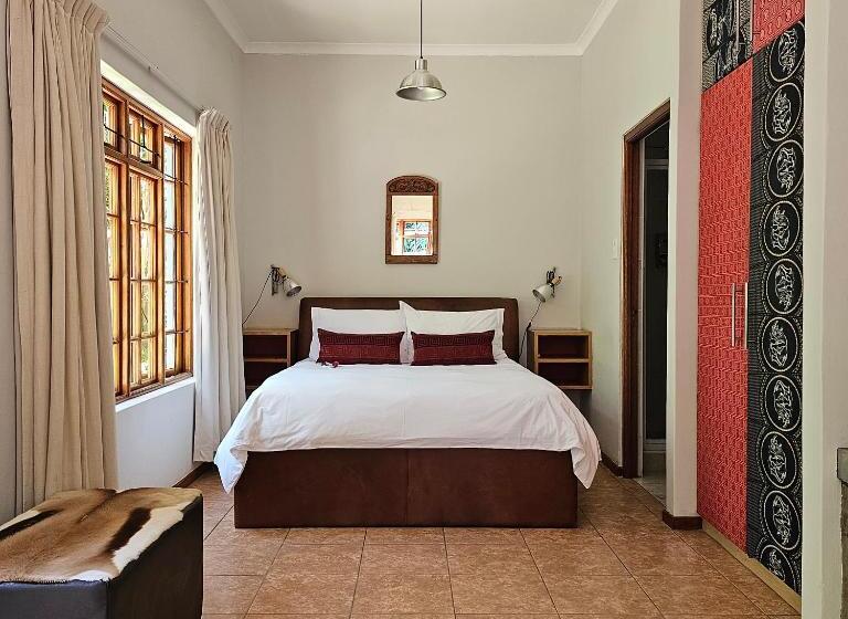 דירת חדר נוף לגינה, House Of House Guest House