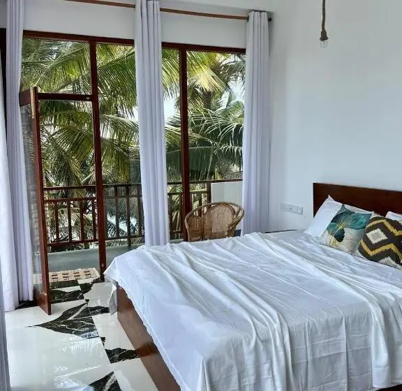 キングサイズベッドのスイートルーム, Coconut Palm Beach Restaurant And Rooms