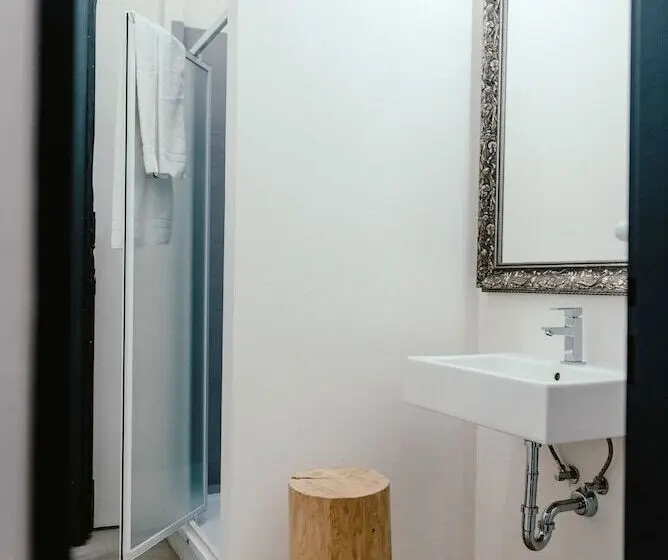 Bed in Shared Room with Shared Bathroom, Wake Up Wellness Hostel