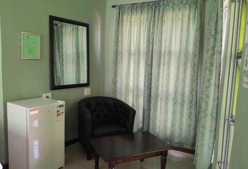 מיטת קינג בסוויטה, Rs Garden Guesthouse