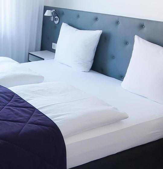 Quarto Premium, Der Grüne Baum