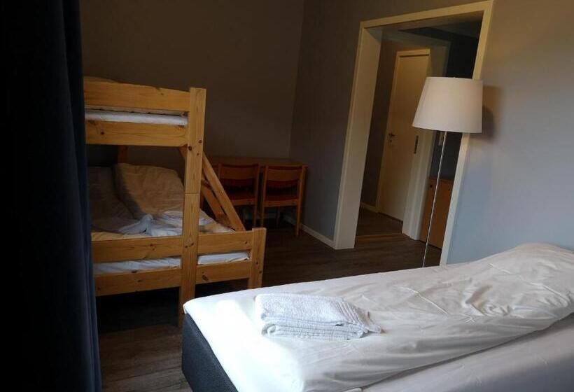 Семейный Номер, Dombåstun Motel