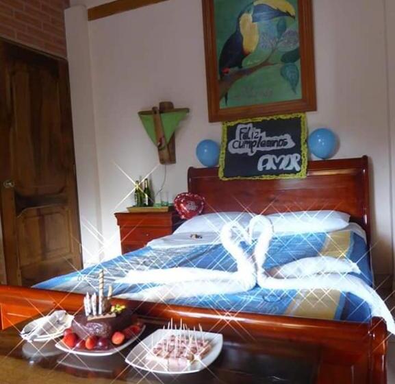 발코니 디럭스 룸, Hostal Casa Cultural Mindo