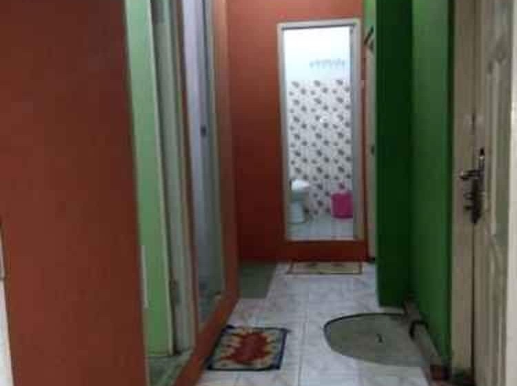 共用房间的床, Sritanjung Homestay