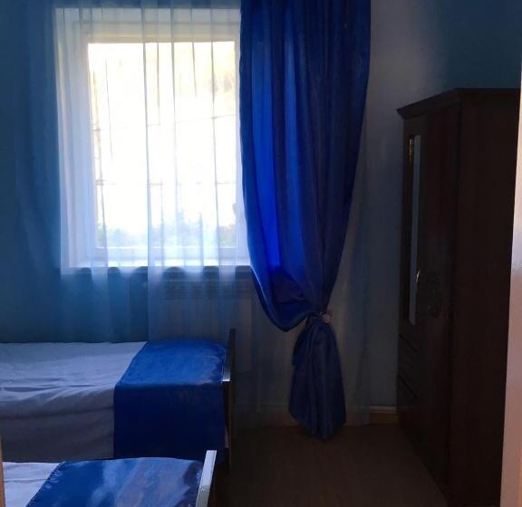 Deluxe Neljän Hengen Huone, Dilbo House