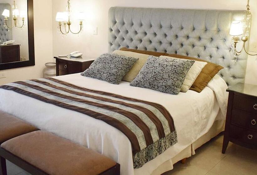 デラックスの４人部屋, Posada Suiza By Prima Collection