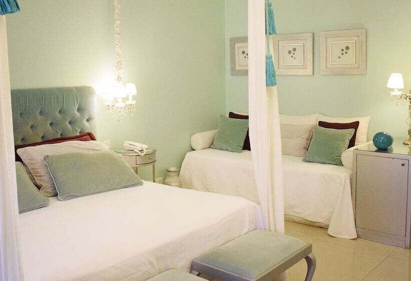 デラックストリプルルーム, Posada Suiza By Prima Collection