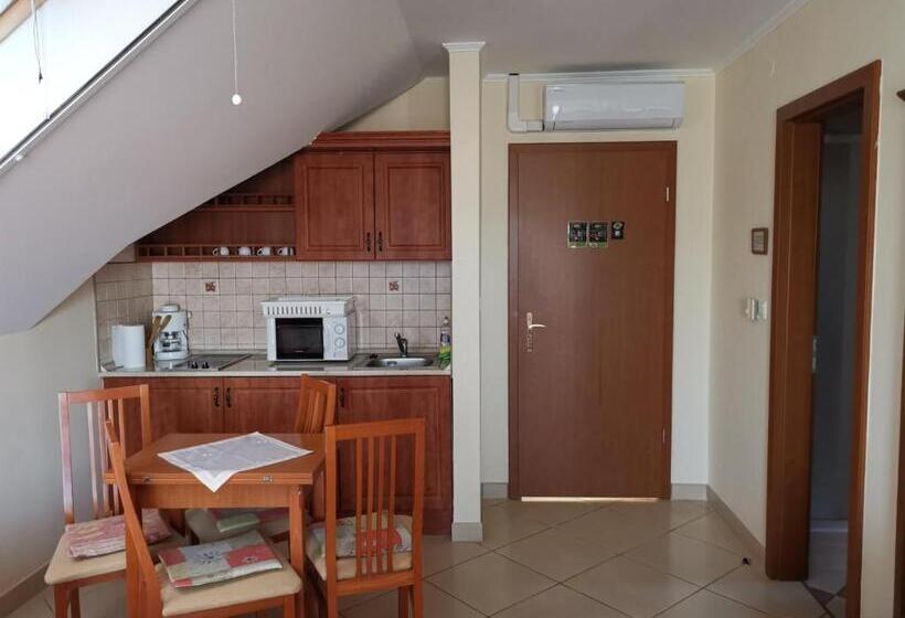 סוויטה משפחתית, Harmónia Panzió